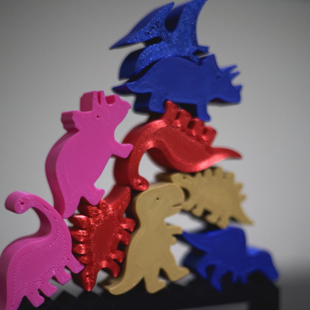 Conjunto de dinossauros silhueta na base